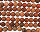 Fossil Coral (red) Faceted Round 14mm