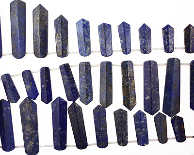 Lapis Drilled Ridged Spear Drop Graduated 11-14x20-50mm